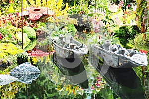 Small sculpture boat in garden photo