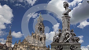Sculpture on the Bruhl Terrace and Hofkirche or Cathedral of Holy Trinity - baroque church in Dresden, Sachsen, Germany