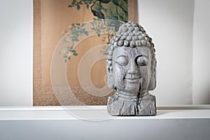 A sculpture of Buddah face