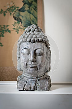 A sculpture of Buddah face