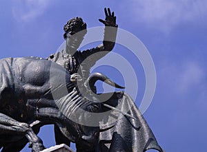 Sculpture of a bullfighter executing a task