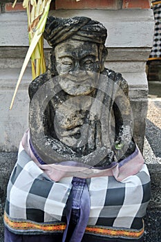 Sculpture and carved antique deity angel god of hindu statue balinese style in Pura Dalem Agung Padangtegal in Mandala Suci Wenara
