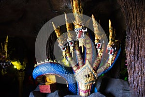 Sculpture carving ancient naga or antique naka statue for thai people travelers travel visit and respect praying blessing wish