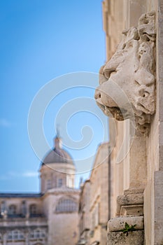 Sculpture and Church tower dome in Dubrovnik