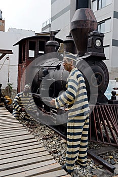 Sculpture of convicts in Ushuaia.