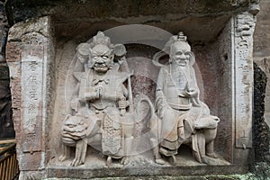 Taoist reliefs of Laozi or Supreme Lord and Mountain God photo