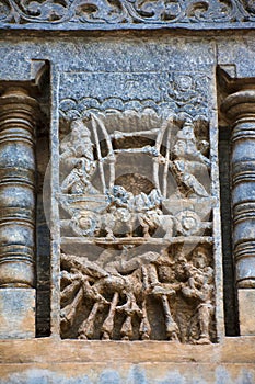 Sculpture depicting a war between Bhishma and Arjuna. Bhishma lying on the bed of arrows. Chennakeshava temple. Belur, Karnataka.