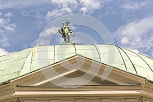 Sculpture of Diana at the top of the dome photo