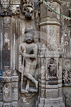 Sculpture of Dwarpala on the wall of Trishund Mayureshshwar Ganesh Temple at Somawar Peth photo