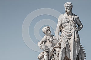 Sculpture of engineer and his scholar on Zoll Bridge in Magdeburg downtown at smooth gradient background, Germany, details,