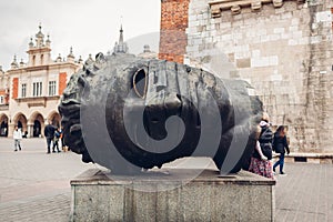 Sculpture of Eros Bendato on Main Market Square in Kracow  Poland. Krakow landmarks and ancient architecture