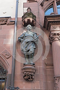 Sculpture on the exterior facade of the city hall roemer frankfurt am main germany photo