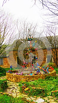 Sculpture Fountain of Solidarity by the artist LEB, Jean-Yves Lebreton, of the Robert Tatin museum in Cossé-le-Vivien France