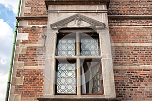 Sculpture guard over window the royal Rosenborg Castle, 17th century. Historical landmarks of Copenhagen, Denmark