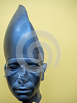 Sculpture head portrait of the ancient Egyptian King Amenophis III