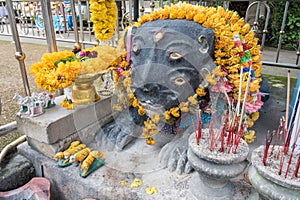 The sculpture of holy monster named `4 ears and 5 eyes` from the local fairy tales in Wat Phra That Doi Khao Kwai of Chiang Rai.