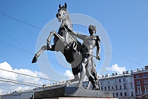 Sculpture with a horse on the Anichkov bridge photo