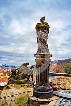 Sculpture at Hradcany Square Prague panorama at twilight Czech Republic