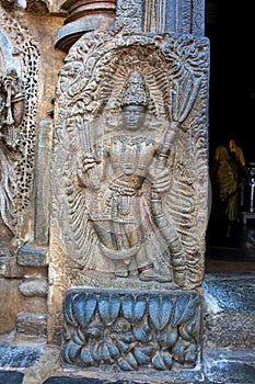 Sculpture of the Kamadeva holdinga sugarcane at the Eastern entrance of Chennakeshava temple, Belur, Karnataka.