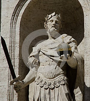 Sculpture of king holding the sword and the cruciger photo