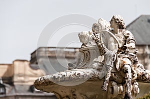 A sculpture of a knight holding a whip in Granja de San Ildefonso, Segovia Spain