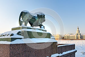 Sculpture of lion on the Admiralteiskaya embankment in winter. Saint Petersburg, Russia