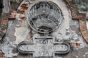 Lion angel figure on the church wall