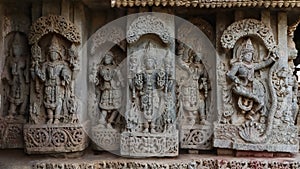 Sculpture of Lord Bramha, Vishnu and Krishna on wall of Sri Lakshimi Narasimha Swamy Temple, Javagal, Hassan, Karnataka
