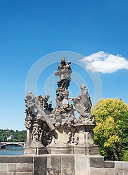 Sculpture of Madonna and Saint Bernard in Prague