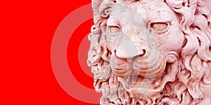 Sculpture of a medieval lion head of stone Italy