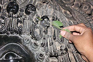 Sculpture with micro carved hallow skull at Hoysaleswara Temple