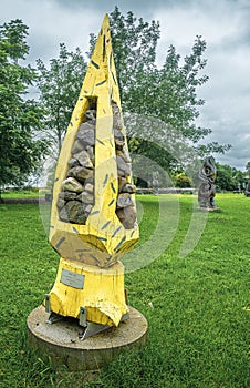 Sculpture OPUS DEI by Alexandre Lecuiyer in the park des trois berets Saint Jean Port Joli