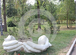Sculpture of palms in the park