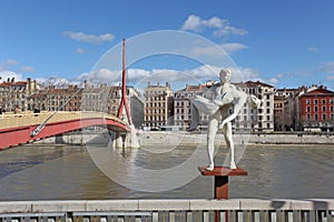 Sculpture and the river Rhone. Lyon, France