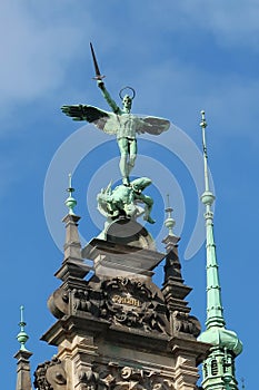 Sculpture on the roof of City hall on the central square of Hamburg. Germany