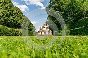 Sculpture seen from behind in a french classical garden (Vaux-le-Vicomte