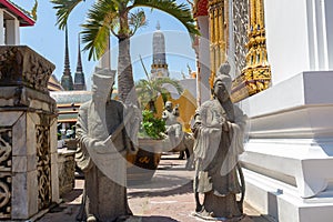 Sculpture of servant monks in buddhist temple