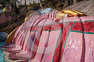 Sculpture showing Sleeping lion`s posture or Reclining Buddha representation of the Buddha lying down.