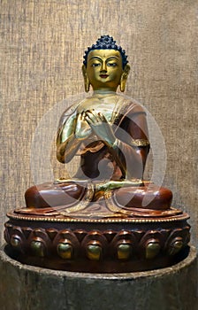 Sculpture Siddhartha Gautama -Sanskrit gold dark red orange coloring