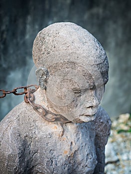 Sculpture of slaves in Stone Town, Zanzibar