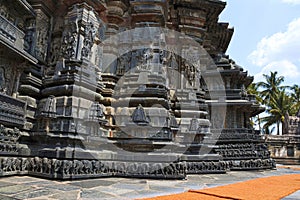 Sculpture of a Sundari, Beatiful Lady, going out with her two children. Chennakesava temple, Belur, Karnataka.