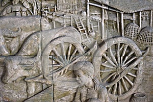 sculpture of thai style on wall is the handmade pattern