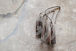 Sculpture tools. Art and craft tools on vintage wood background. Close-up