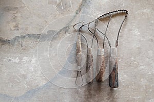 Sculpture tools. Art and craft tools on vintage wood background. Close-up