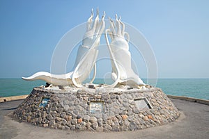Sculpture of two giant squid in the background of the Gulf of Thailand. Cha-Am