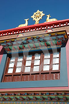 Sculpture of the wheel of Dharma and two deers on monastery roof,Rewalsar,India