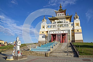 Sculpture of a White elder at the background of a Buddhist temple \