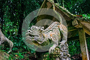 Sculpture of a wild mythic animal in the magical garden tropical forest at Koh Samui. Thailand