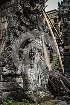 Sculpture of woman in Pura Dalem Segara Madhu