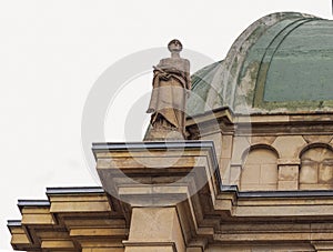 The sculpture of a woman at the top of the Ontario Government building
